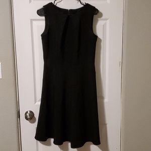 Black sleeveless fit and flare work dress